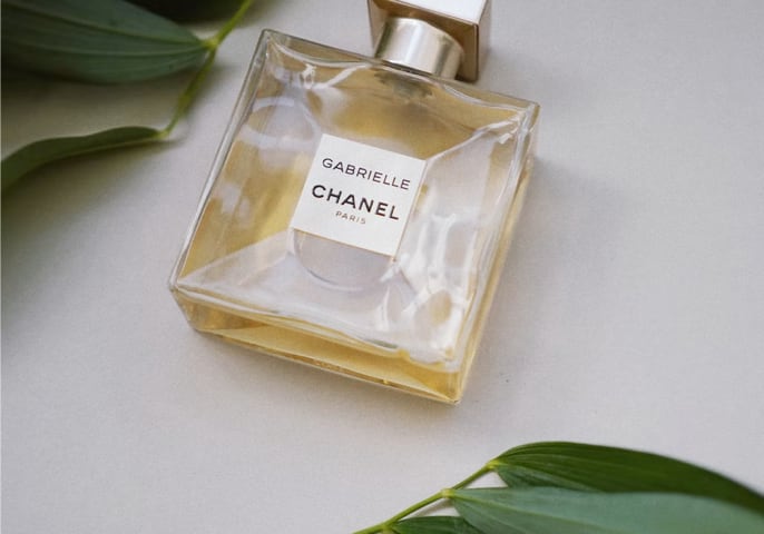 perfume bottom and some leaves